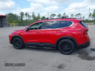 2022 Hyundai Santa Fe XRT z VIN 5NMS64AJ3NH382831, wystawiony jako IAAI lot #42100573 z przebiegiem 46 502 mil mil oraz . Historia ofert i sprzedaży dostępna na DreamBid. Obrazek 14.