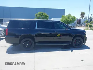 2017 Chevrolet Suburban LT z VIN 1GNSKHKC9HR234340, wystawiony jako IAAI lot #42327787 z przebiegiem 79 013 mil mil oraz . Historia ofert i sprzedaży dostępna na DreamBid. Obrazek 13.