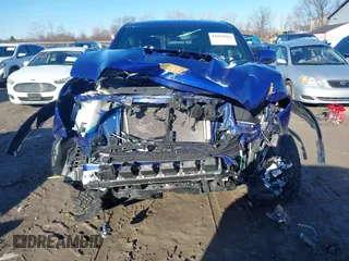 2023 Toyota Tacoma 4WD SR with VIN 3TMCZ5AN9PM559919, listed as a IAAI auction lot 41855044 with 46,153 mi miles. Bid and sale history available at carsss.com. Image 6.