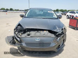 2017 Ford Focus Titanium with VIN 1FADP3J20HL253446, listed as a Copart auction lot 64196895 with 150,633 mi miles and Salvage title. Bid and sale history available at DreamBid. Image 5.