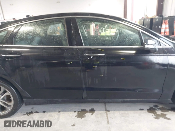 2019 Ford Fusion SEL with VIN 3FA6P0CD2KR260770, listed as a IAAI auction lot 41564261 with 108,818 mi miles and . Bid and sale history available at DreamBid. Image 14.