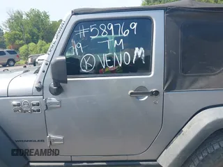 2015 Jeep Wrangler Freedom Edition with VIN 1C4AJWAG4FL589769, listed as a IAAI auction lot 42704488 with 194,414 mi miles and . Bid and sale history available at DreamBid. Image 14.