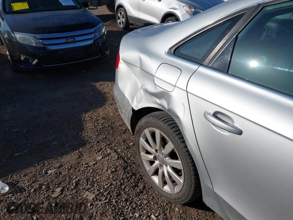 2013 Audi A4 Premium with VIN WAUBFAFL9DA161085, listed as a IAAI auction lot 41976939 with 184,536 mi miles and . Bid and sale history available at DreamBid. Image 6.