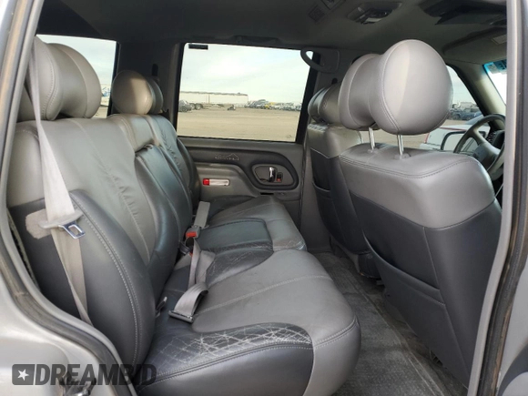 2000 GMC Denali z VIN 1GKEK63R9YR225073, wystawiony jako Copart lot #86819964 z przebiegiem 207 827 mil mil oraz Szkody całkowita. Historia ofert i sprzedaży dostępna na DreamBid. Obrazek 11.