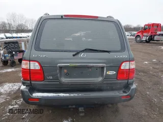 2000 Lexus LX 470 with VIN JT6HT00W9Y0096647, listed as a IAAI auction lot 41376347 with 231,916 mi miles and . Bid and sale history available at DreamBid. Image 16.