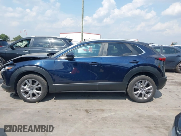 2023 Mazda CX-30 S Carbon Edition with VIN 3MVDMBCM4PM542160, listed as a IAAI auction lot 42175395 with 11,340 mi miles and . Bid and sale history available at DreamBid. Image 14.