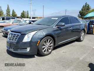 2013 Cadillac XTS Luxury with VIN 2G61P5S30D9110694, listed as a Copart auction lot 54615455 with 169,936 mi miles and Salvage Title. Bid and sale history available at carsss.com. Image 1.
