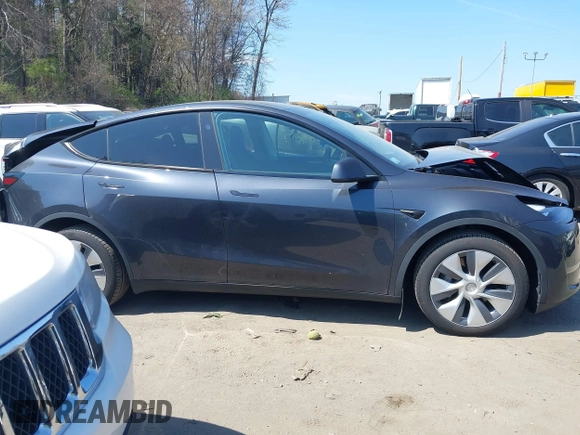 2024 Tesla Model Y Long Range with VIN 7SAYGDEE6RA225161, listed as a IAAI auction lot 42083140 with 28,289 mi miles and . Bid and sale history available at DreamBid. Image 13.