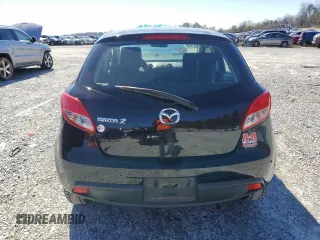 2012 Mazda 2 Sport with VIN JM1DE1KZ2C0149132, listed as a Copart auction lot 45177385 with 146,966 mi miles and Salvage Title. Bid and sale history available at DreamBid. Image 6.