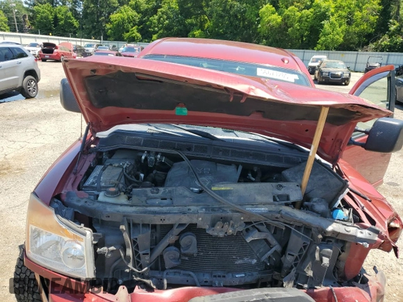 2015 Nissan Titan Pro-4X with VIN 1N6BA0EC5FN506358, listed as a Copart auction lot 56671205 with 153,712 mi miles and Salvage title. Bid and sale history available at DreamBid. Image 11.