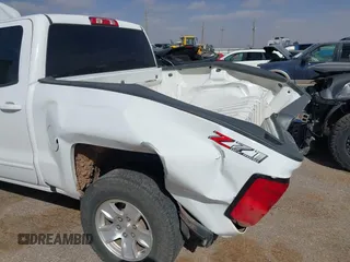 2018 Chevrolet Silverado 1500 LT with VIN 3GCUKREC9JG316576, listed as a IAAI auction lot 41830992 with 153,467 mi miles. Bid and sale history available at carsss.com. Image 6.