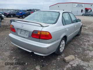2000 Honda Civic VP z VIN 2HGEJ6613YH575630, wystawiony jako IAAI lot #41525214 z przebiegiem 251 481 mil mil oraz . Historia ofert i sprzedaży dostępna na DreamBid. Obrazek 4.