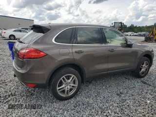 2014 Porsche Cayenne S Hybrid with VIN WP1AE2A29ELA51406, listed as a Copart auction lot 61163965 with 99,047 mi miles and Clean title. Bid and sale history available at DreamBid. Image 3.