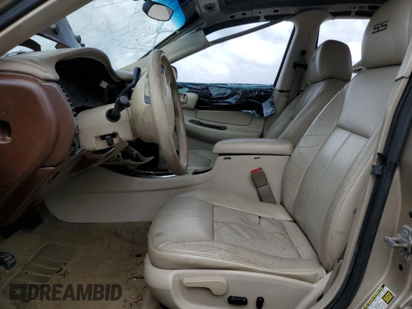 2004 Chevrolet Impala with VIN 2G1WF52E849348129, listed as a Copart auction lot 55641485 with 168,263 mi miles and Salvage title. Bid and sale history available at DreamBid. Image 7.