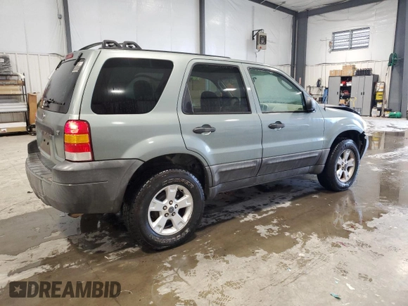 2006 Ford Escape XLT with VIN 1FMYU03136KD34592, listed as a Copart auction lot 71872694 with 185,292 mi miles and Clean Title. Bid and sale history available at carsss.com. Image 3.