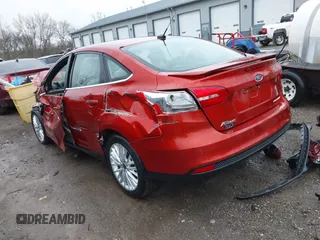2018 Ford Focus Titanium with VIN 1FADP3J20JL280698, listed as a IAAI auction lot 41823530 with 54,841 mi miles and . Bid and sale history available at DreamBid. Image 3.