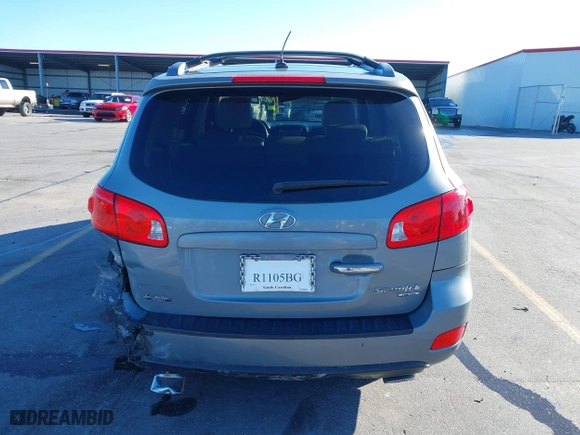 2009 Hyundai Santa Fe SE with VIN 5NMSH13E09H259020, listed as a IAAI auction lot 41236834 with 180,776 mi miles. Bid and sale history available at carsss.com. Image 16.