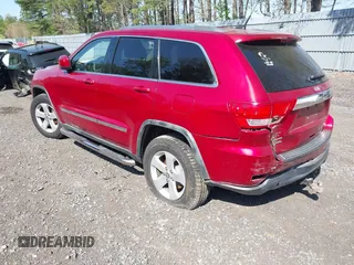 2011 Jeep Grand Cherokee Laredo with VIN 1J4RR4GG5BC512095, listed as a IAAI auction lot 42156490 with 160,749 mi miles. Bid and sale history available at carsss.com. Image 3.