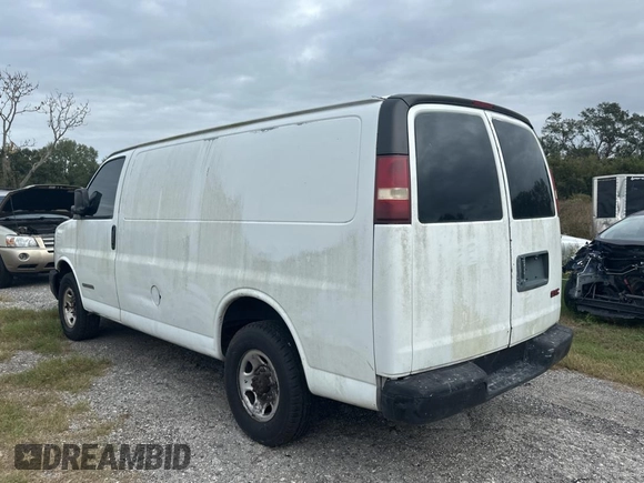 2003 GMC Savana Cargo z VIN 1GTHG35U431113170, wystawiony jako Copart lot #82019294 z przebiegiem 293 807 mil mil oraz Czysty tytuł • Clean title. Historia ofert i sprzedaży dostępna na DreamBid. Obrazek 3.