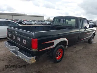 1990 Ford F-150 with VIN 1FTEX15H0LKB34683, listed as a IAAI auction lot 41468440 with 23,706 mi miles. Bid and sale history available at carsss.com. Image 4.