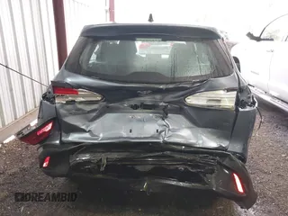 2022 Toyota Corolla Cross L with VIN 7MUAAAAG9NV034659, listed as a IAAI auction lot 42125356 with 14,631 mi miles and . Bid and sale history available at DreamBid. Image 6.