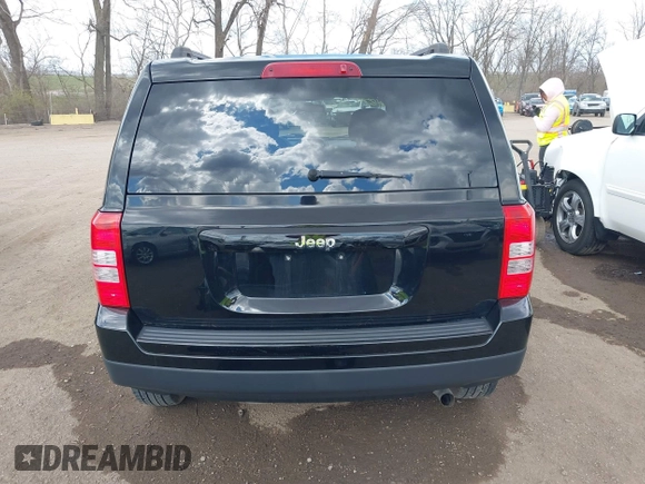 2014 Jeep Patriot Sport with VIN 1C4NJPBA4ED844253, listed as a IAAI auction lot 41879323 with 170,551 mi miles and . Bid and sale history available at carsss.com. Image 16.