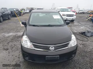 2011 Nissan Versa 1.8 SL with VIN 3N1BC1CP2BL403713, listed as a IAAI auction lot 41313488 with 91,491 mi miles. Bid and sale history available at carsss.com. Image 12.
