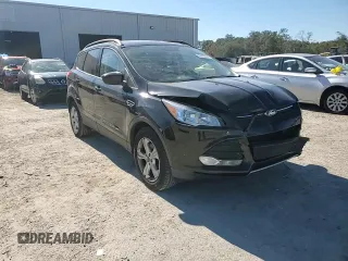 2016 Ford Escape SE with VIN 1FMCU9GX1GUC24692, listed as a Copart auction lot 88102815 with 114,900 mi miles and Salvage Title. Bid and sale history available at DreamBid. Image 14.