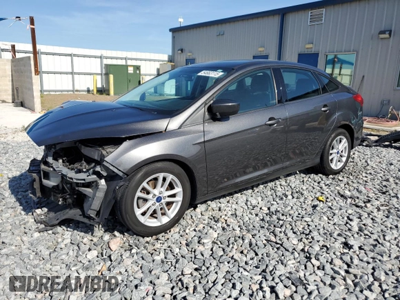 2018 Ford Focus SE with VIN 1FADP3F2XJL254344, listed as a Copart auction lot 54663115 with 84,850 mi miles and Salvage title. Bid and sale history available at DreamBid. Image 1.
