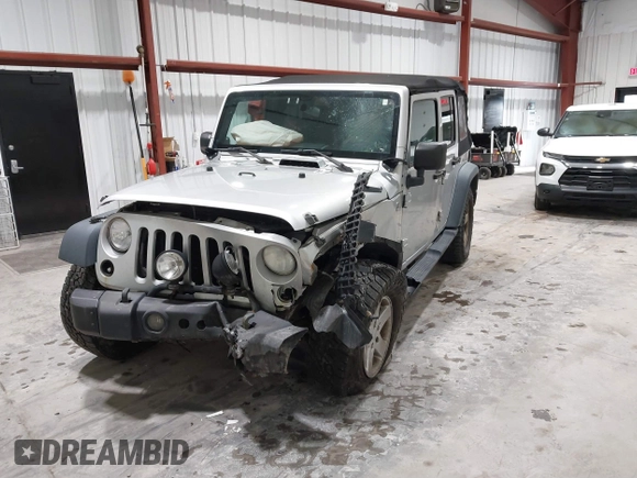 2008 Jeep Wrangler Unlimited X with VIN 1J4GA391X8L647311, listed as a IAAI auction lot 41499620 with 140,601 mi miles and . Bid and sale history available at carsss.com. Image 2.
