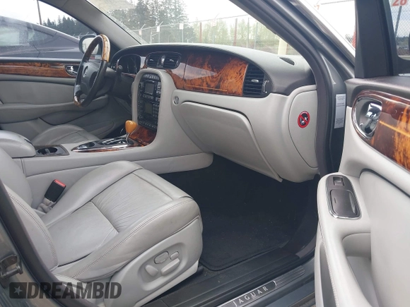 2004 Jaguar XJ with VIN SAJEA74C94SG10199, listed as a IAAI auction lot 42007186 with 138,807 mi miles and . Bid and sale history available at DreamBid. Image 5.