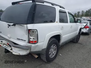 2004 Chevrolet Tahoe LS with VIN 1GNEK13ZX4R308382, listed as a IAAI auction lot 41901448 with 205,922 mi miles. Bid and sale history available at carsss.com. Image 4.