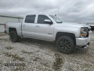 2017 Chevrolet Silverado 1500 LT with VIN 3GCUKREC0HG431285, listed as a Copart auction lot 49585755 with 134,008 mi miles and Salvage Title. Bid and sale history available at DreamBid. Image 4.