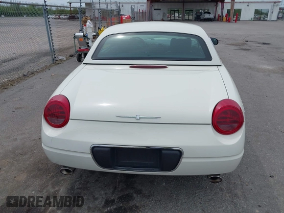 2003 Ford Thunderbird Deluxe z VIN 1FAHP60A03Y113355, wystawiony jako IAAI lot #41890414 z przebiegiem 147 620 mil mil oraz . Historia ofert i sprzedaży dostępna na DreamBid. Obrazek 16.