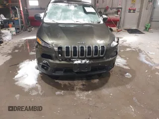 2015 Jeep Cherokee Sport with VIN 1C4PJMAB8FW738718, listed as a IAAI auction lot 41575745 with 113,227 mi miles. Bid and sale history available at carsss.com. Image 12.