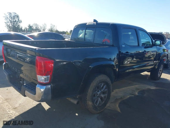 2017 Toyota Tacoma SR with VIN 5TFAX5GN5HX095074, listed as a IAAI auction lot 41814654 with 120,782 mi miles. Bid and sale history available at carsss.com. Image 4.