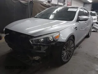 2016 Kia Cadenza Premium with VIN KNALN4D72G5214513, listed as a IAAI auction lot 41879699 with 117,724 mi miles. Bid and sale history available at carsss.com. Image 2.
