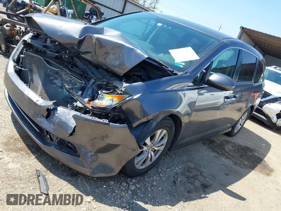2016 Honda Odyssey SE with VIN 5FNRL5H33GB125693, listed as a IAAI auction lot 41994036 with 163,617 mi miles and . Bid and sale history available at DreamBid. Image 18.