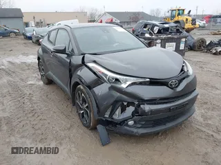 2018 Toyota C-HR XLE with VIN NMTKHMBX1JR004512, listed as a IAAI auction lot 42011240 with 101,812 mi miles. Bid and sale history available at carsss.com. Image 1.