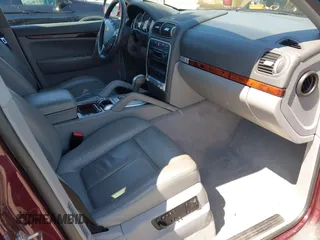 2005 Porsche Cayenne S with VIN WP1AB29P05LA63064, listed as a IAAI auction lot 42153705 with 147,843 mi miles and . Bid and sale history available at DreamBid. Image 5.