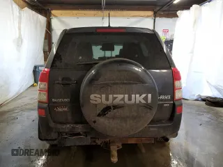 2011 Suzuki Grand Vitara Premium z VIN JS3TD0D24B4103142, wystawiony jako Copart lot #43715135 z przebiegiem 170 422 mil mil oraz Szkoda całkowita • Salvage title. Historia ofert i sprzedaży dostępna na DreamBid. Obrazek 6.