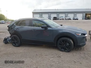 2023 Mazda CX-30 S Carbon Edition with VIN 3MVDMBCM4PM577619, listed as a IAAI auction lot 42219801 with 24,784 mi miles and . Bid and sale history available at DreamBid. Image 13.