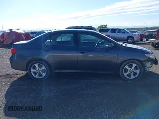 2013 Toyota Corolla L with VIN 2T1BU4EE9DC002558, listed as a IAAI auction lot 39670419 with 198,102 mi miles and . Bid and sale history available at DreamBid. Image 13.