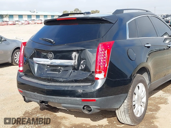 2015 Cadillac SRX with VIN 3GYFNAE37FS598023, listed as a IAAI auction lot 41198546 with 127,373 mi miles and . Bid and sale history available at carsss.com. Image 6.