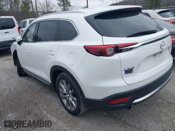 2016 Mazda CX-9 Grand Touring with VIN JM3TCADY0G0113779, listed as a IAAI auction lot 41466750 with 58,035 mi miles and . Bid and sale history available at DreamBid. Image 3.