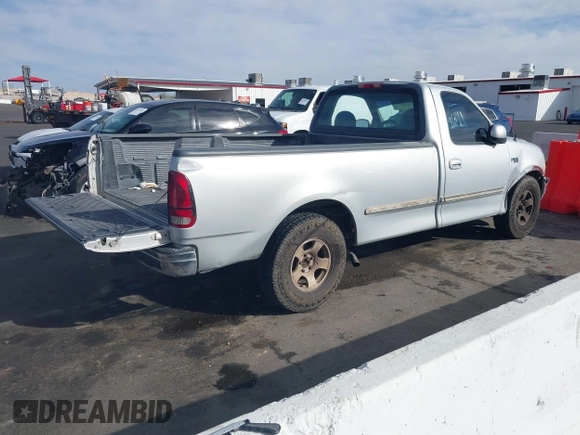 1997 Ford F-150 with VIN 1FTEF17W3VLA19510, listed as a IAAI auction lot 41711010 with 214,984 mi miles and . Bid and sale history available at DreamBid. Image 4.