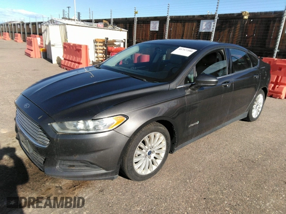 2015 Ford Fusion S Hybrid with VIN 3FA6P0UU6FR307898, listed as a IAAI auction lot 41717200 with 177,735 mi miles. Bid and sale history available at carsss.com. Image 2.