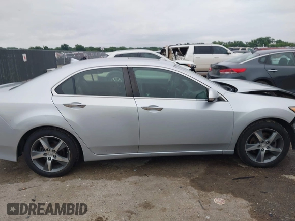 2012 Acura TSX Special Edition z VIN JH4CU2F84CC005861, wystawiony jako IAAI lot #42431118 z przebiegiem 121 892 mil mil oraz . Historia ofert i sprzedaży dostępna na DreamBid. Obrazek 13.