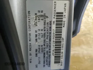 2011 Mazda Mazda3 i Sport with VIN JM1BL1UF2B1900917, listed as a Copart auction lot 50992075 with 131,166 mi miles and Salvage Title. Bid and sale history available at carsss.com. Image 12.