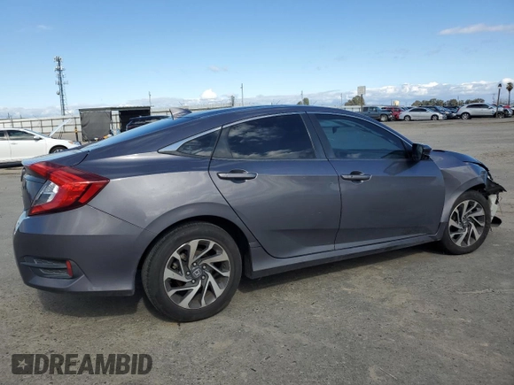 2018 Honda Civic EX с VIN 2HGFC2F71JH519669, выставлен на аукционе Copart как лот 47283725 с пробегом 130 590 миль миль и Списание • Salvage title. История ставок и продаж доступна на DreamBid. Изображение 3.